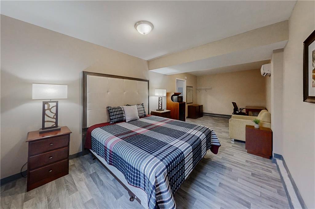 2284 Emerald Springs Drive Decatur, GA 30035 - Photo 28 of 30 a bed room with a bed and a night stand