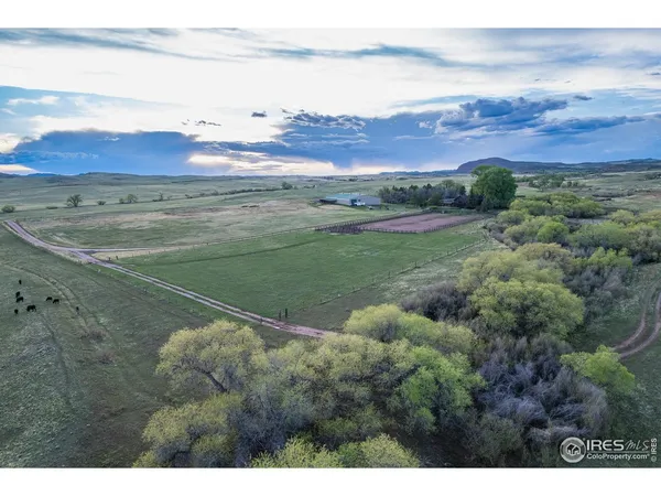 a view of an ocean and a mountain