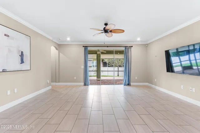 a bathroom with a sink a large mirror and a bathtub