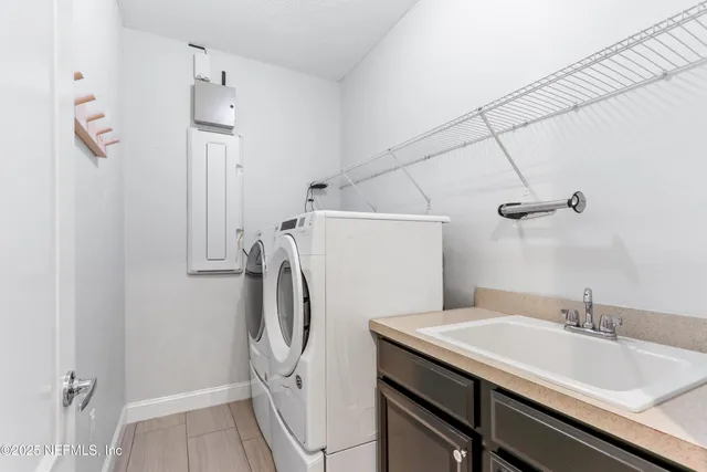 an aerial view of a house with outdoor space swimming pool and mountain view