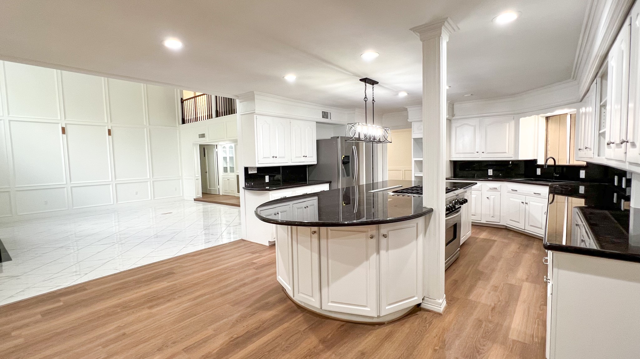 372 Robbins Drive Houston, TX 77024 - Photo 6 of 18 Designed with both form and function in mind, the kitchen maintains the sleek monochromatic scheme and open concept of the home, with thoughtful design touches in every corner.