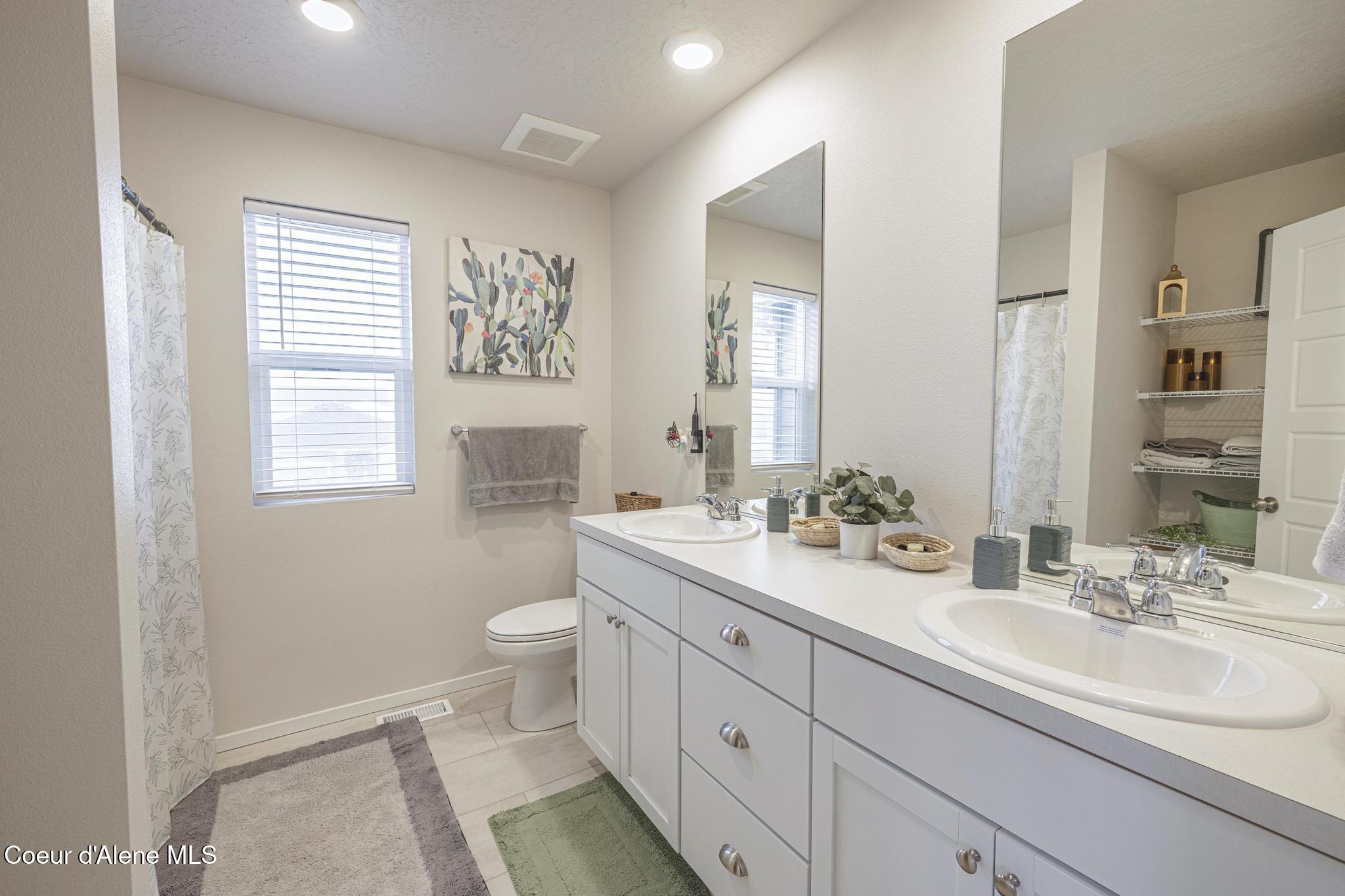 3061 North Allison Street Post Falls, ID 83854 - Photo 13 of 21 Upstairs Bathroom