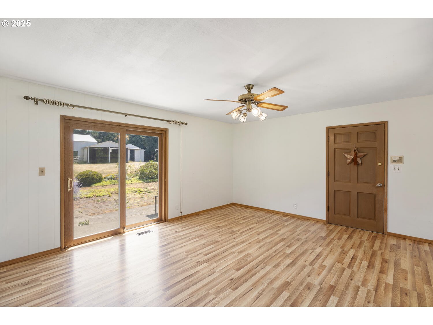 20068 South Ridge Road Oregon City, OR 97045 - Photo 15 of 47 wooden floor in an empty room with a window