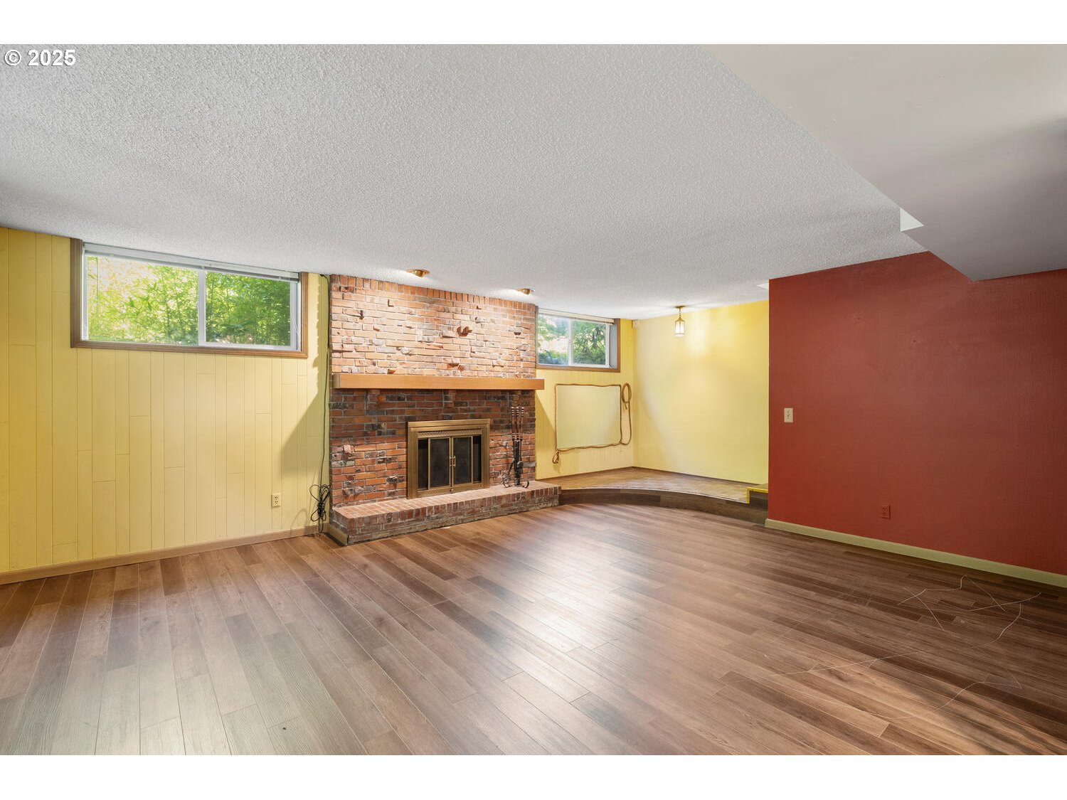 20068 South Ridge Road Oregon City, OR 97045 - Photo 22 of 47 a view of an empty room with a fireplace and a window