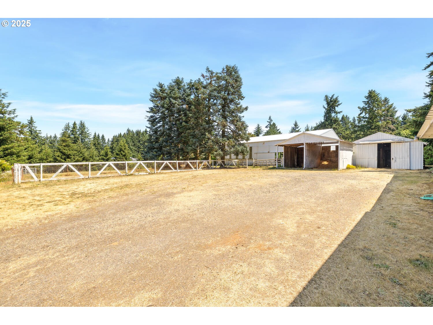 20068 South Ridge Road Oregon City, OR 97045 - Photo 5 of 47 a view of a swimming pool with an outdoor seating