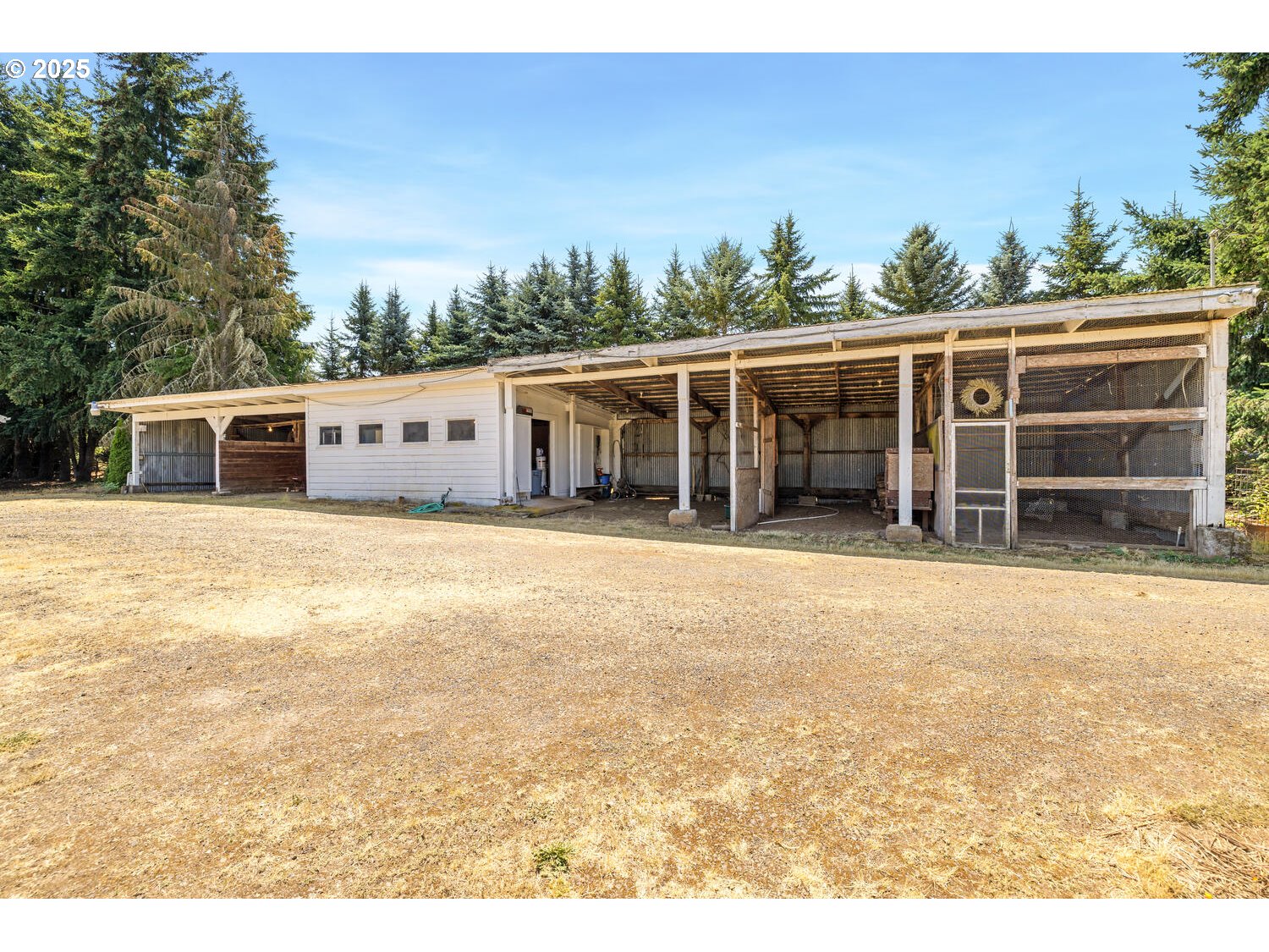20068 South Ridge Road Oregon City, OR 97045 - Photo 8 of 47 a view of a house with a backyard