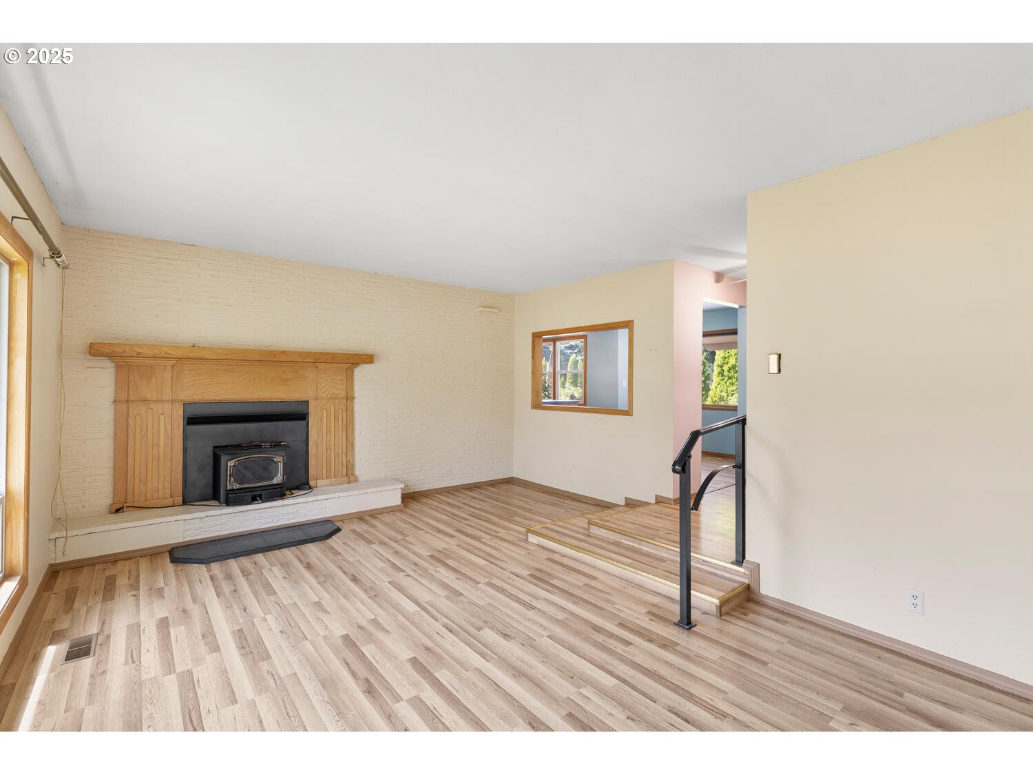 20068 South Ridge Road Oregon City, OR 97045 - Photo 10 of 47 a view of an empty room and a fireplace