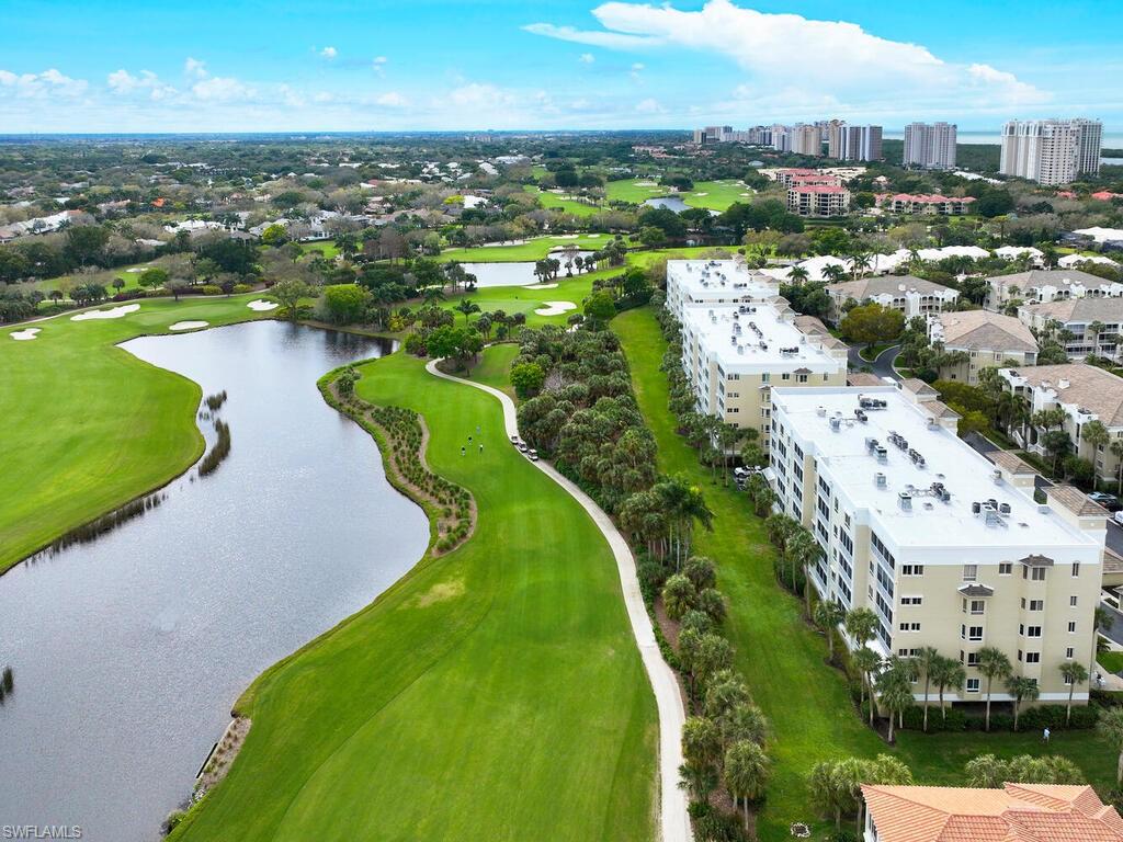 7655 Pebble Creek Circle, Unit 404 Naples, FL 34108 - Photo 17 of 19 an aerial view of a city