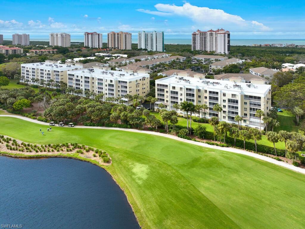 7655 Pebble Creek Circle, Unit 404 Naples, FL 34108 - Photo 18 of 19 a view of a city