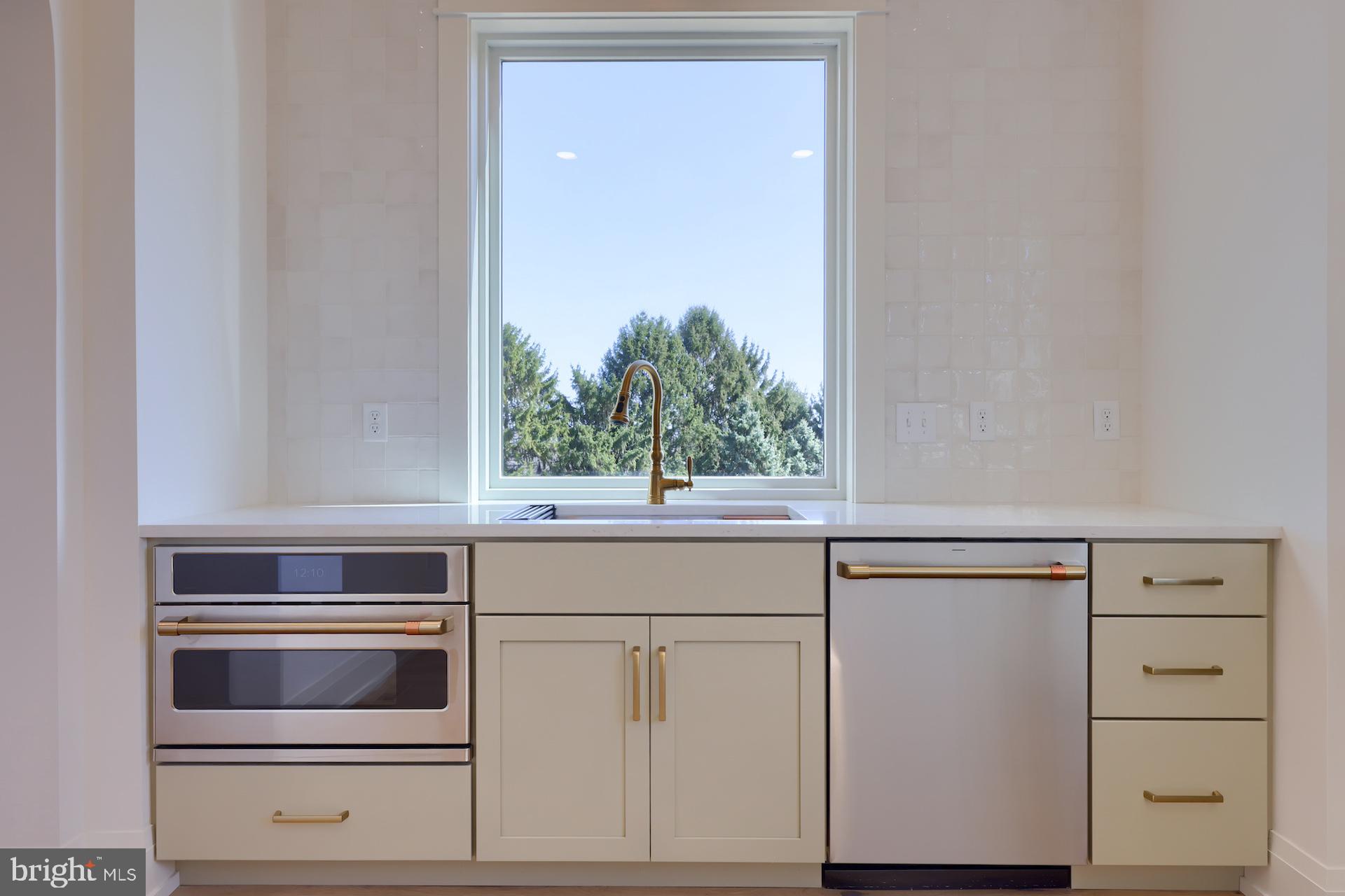 1233 Hunsicker Road Lancaster, PA 17601 - Photo 13 of 23 a view of washer and dryer with wooden floor