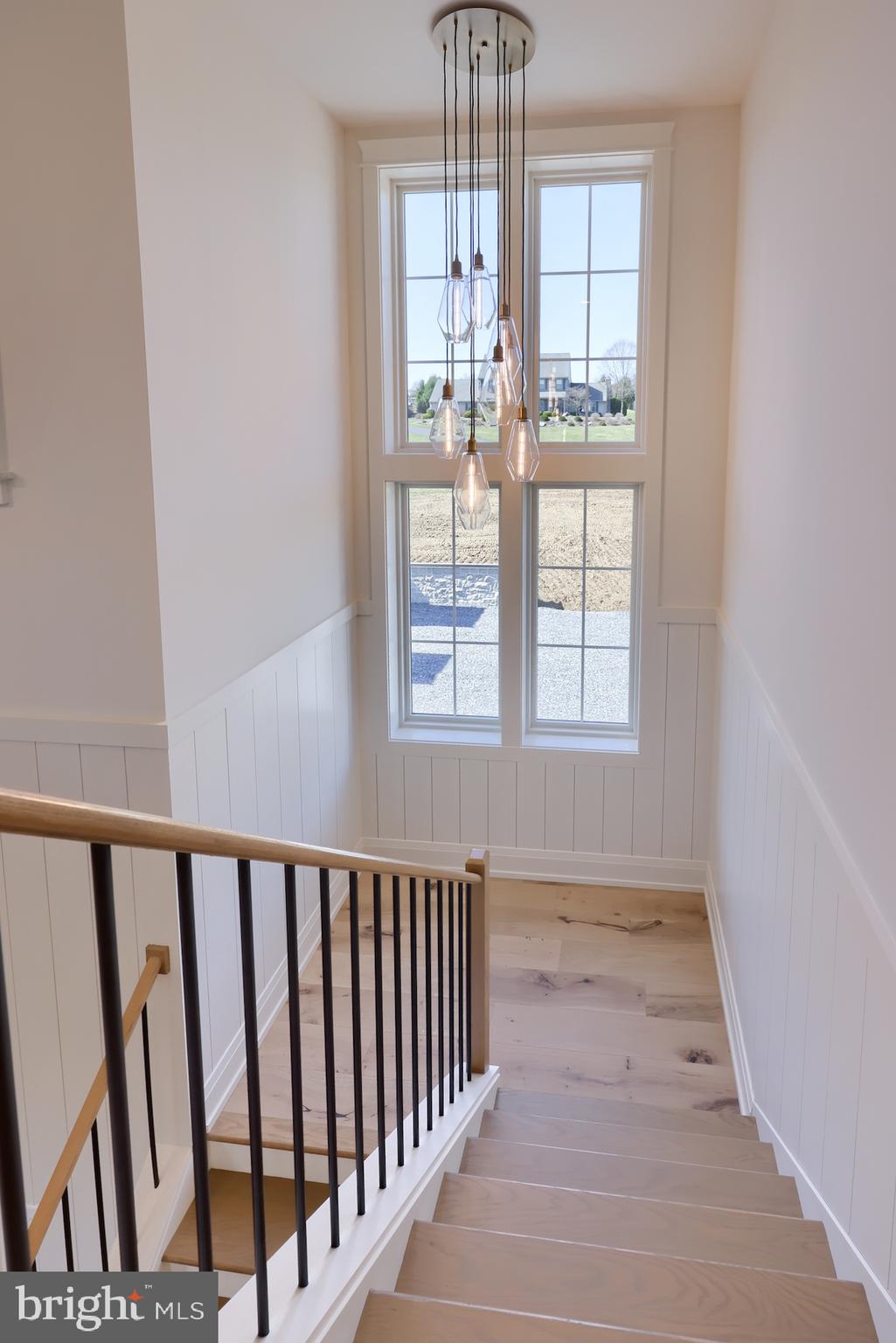 1233 Hunsicker Road Lancaster, PA 17601 - Photo 18 of 23 a view of empty room with wooden floor and fan