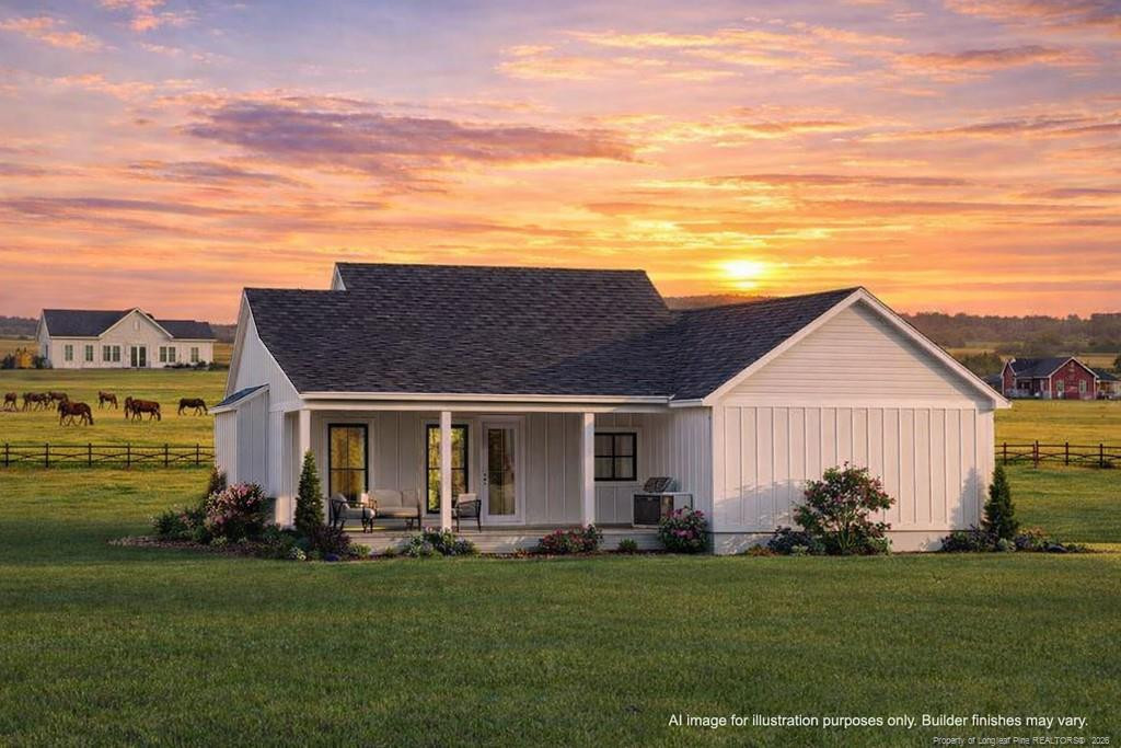0 Paddock Meadows Red Springs, NC 28377 - Photo 2 of 29 a front view of a house with a garden