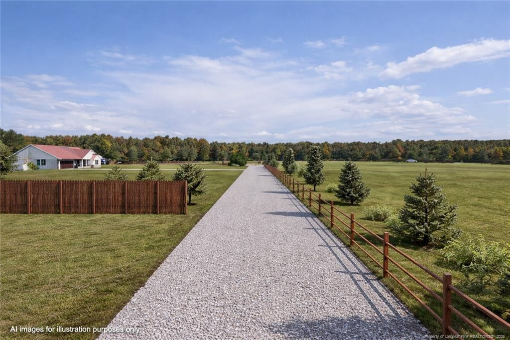 0 Paddock Meadows Red Springs, NC 28377 - Photo 24 of 29 a view of a lake with a yard
