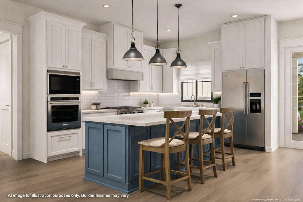 0 Paddock Meadows Red Springs, NC 28377 - Photo 5 of 29 a kitchen with stainless steel appliances a stove a table a sink refrigerator and cabinets
