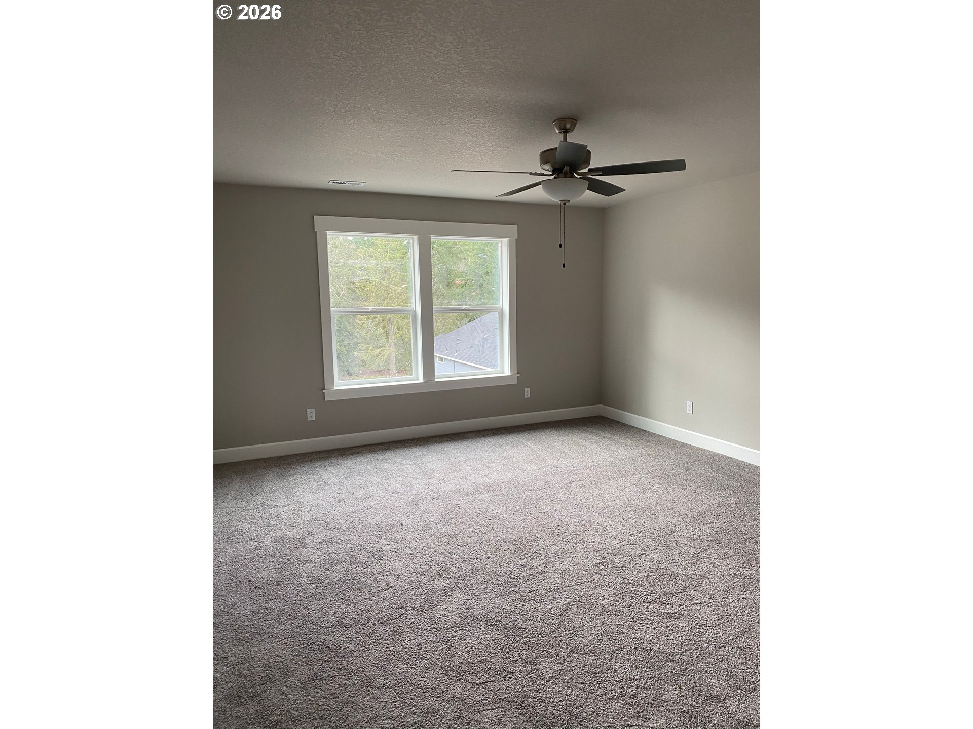 1729 Northeast Cascadia Ridge Drive Estacada, OR 97023 - Photo 15 of 19 a view of an empty room with a window