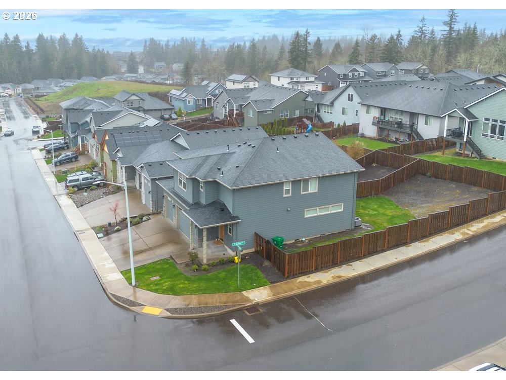 1729 Northeast Cascadia Ridge Drive Estacada, OR 97023 - Photo 7 of 19 a view of a house with a yard and mountain