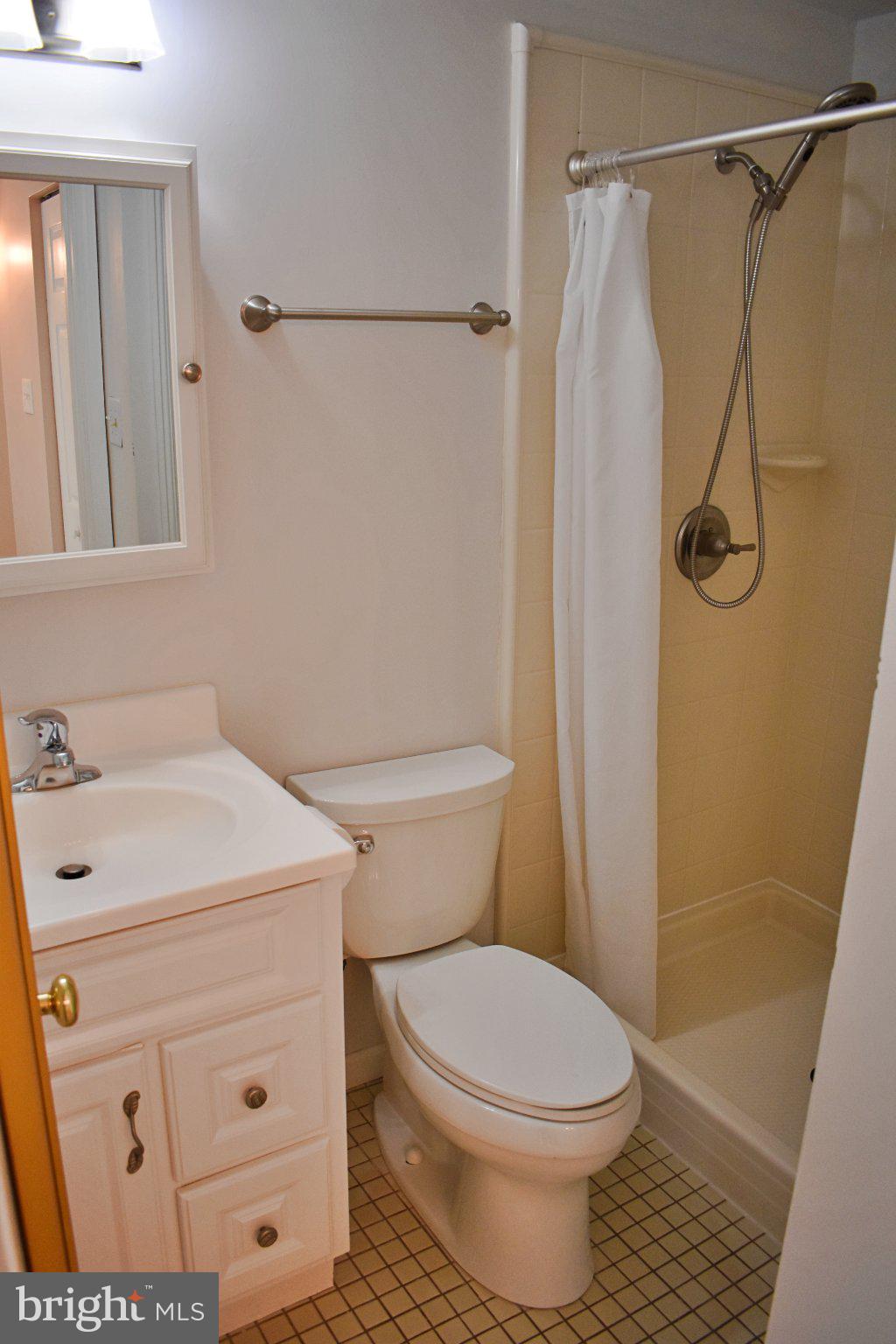 8097 Winding Way Court Springfield, VA 22153 - Photo 19 of 44 Compact and functional bathroom oasis.