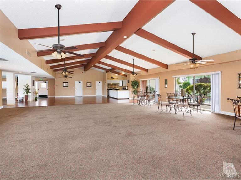 2400 East Pleasant Valley Road, Unit 136 Oxnard, CA 93033 - Photo 14 of 16 a big room with chandelier