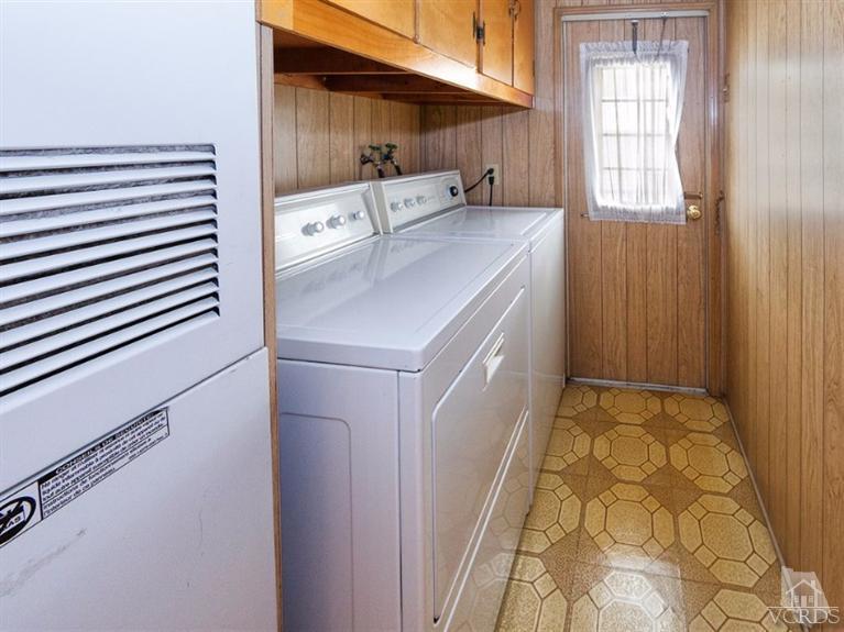 2400 East Pleasant Valley Road, Unit 136 Oxnard, CA 93033 - Photo 10 of 16 a utility room with dryer and washer
