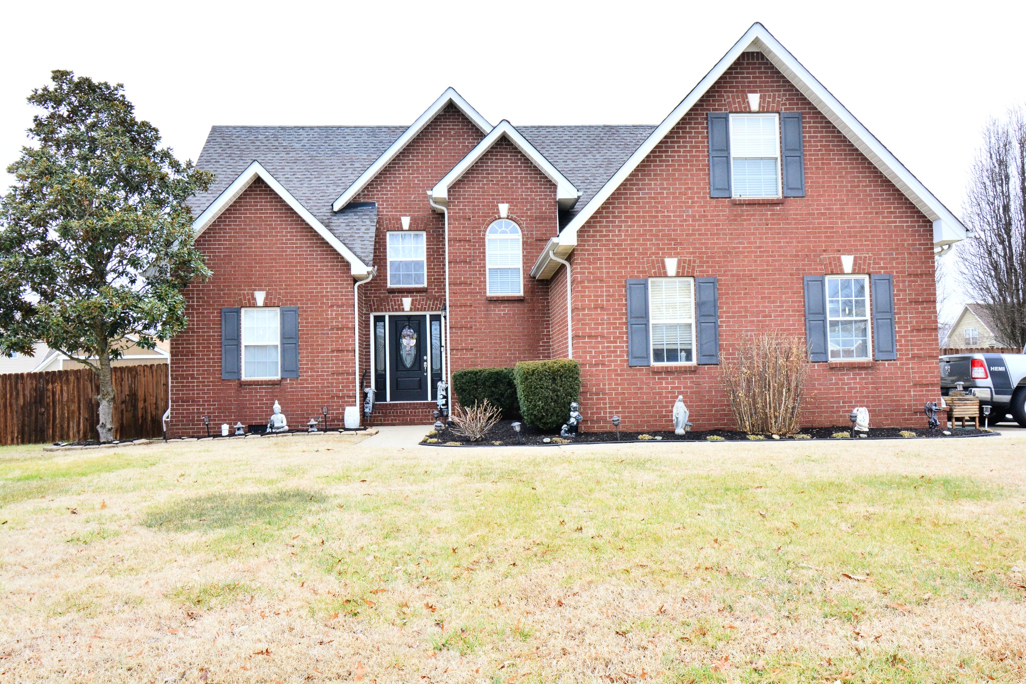 3418 Wellington Place Murfreesboro, TN 37128 - Photo 2 of 31 a front view of a house with a yard