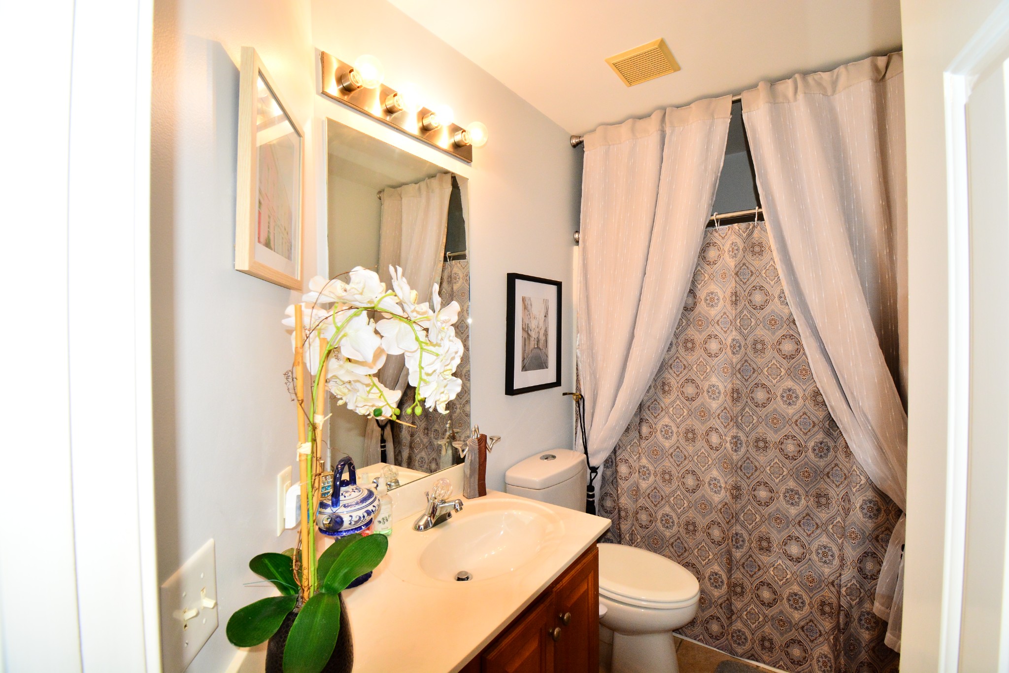 3418 Wellington Place Murfreesboro, TN 37128 - Photo 26 of 31 a bathroom with a sink toilet and shower