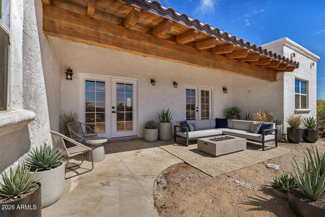 317 West Frontier Street Apache Junction, AZ 85120 - Photo 14 of 14 a view of a house with backyard and sitting area