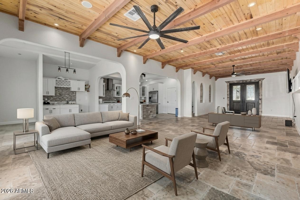 317 West Frontier Street Apache Junction, AZ 85120 - Photo 3 of 14 a living room with furniture and a chandelier