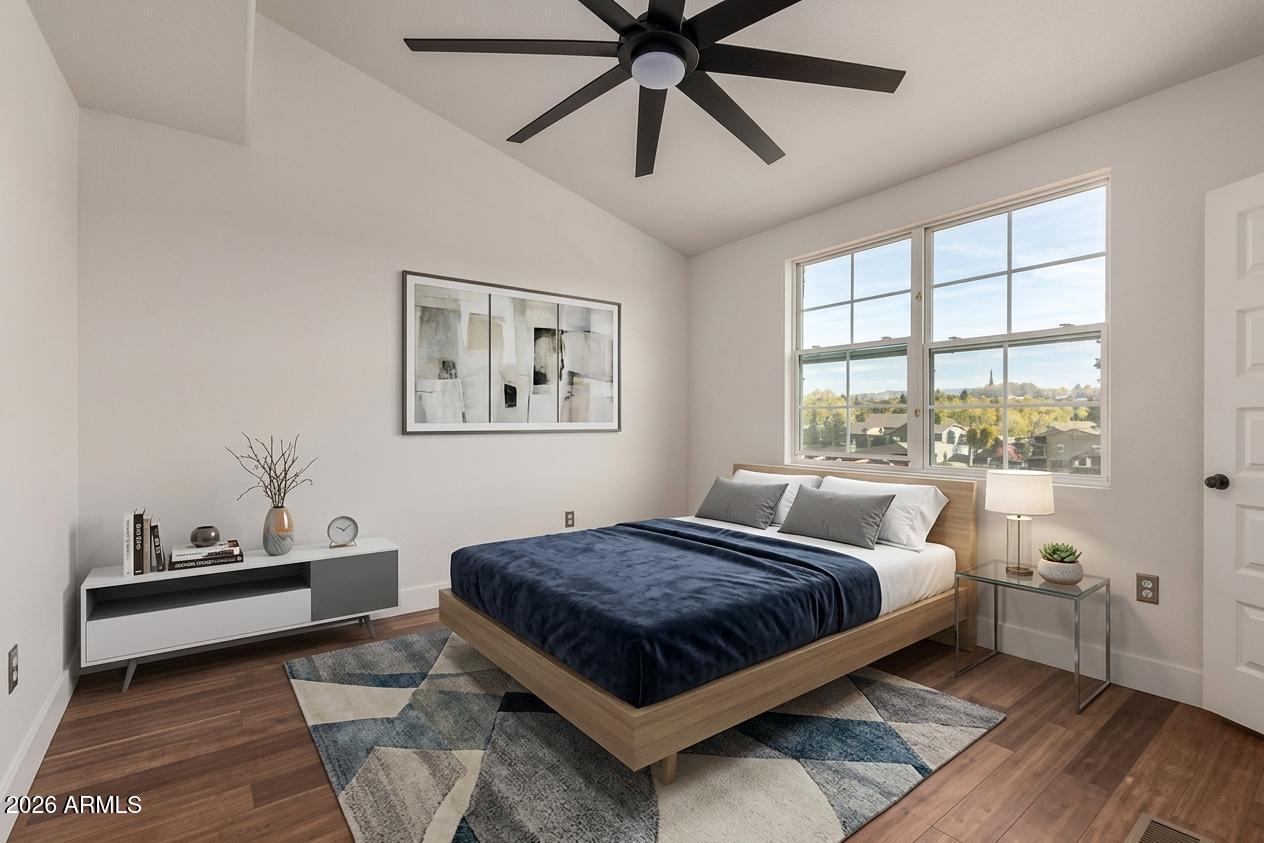 317 West Frontier Street Apache Junction, AZ 85120 - Photo 9 of 14 a bed sitting in a bedroom next to a window