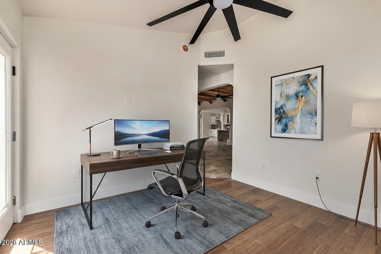 317 West Frontier Street Apache Junction, AZ 85120 - Photo 10 of 14 a view of a workspace with furniture and wooden floor
