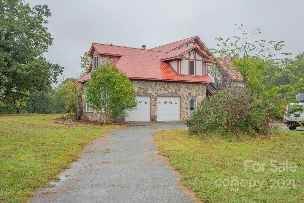 577 Crousetown Road Lexington, NC 27292 - Photo 26 of 39 a front view of a house with a yard and garage