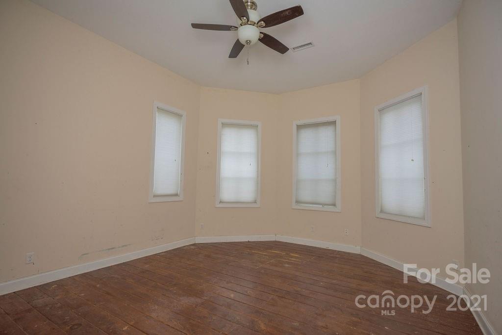 577 Crousetown Road Lexington, NC 27292 - Photo 5 of 39 a view of an empty room with a window