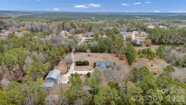 a view of a yard with trees