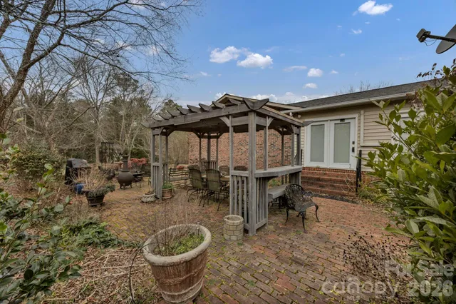 a view of road with large trees