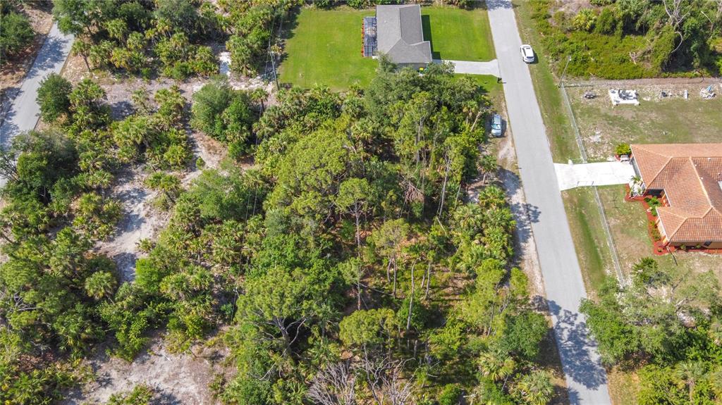 356 Lindon Street Port Charlotte, FL 33954 - Photo 13 of 18 an aerial view of a house with a yard