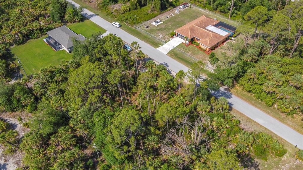 356 Lindon Street Port Charlotte, FL 33954 - Photo 14 of 18 an aerial view of a house with a yard