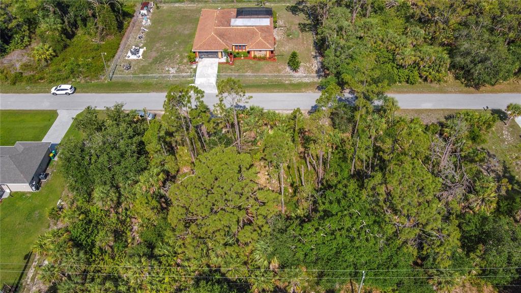 356 Lindon Street Port Charlotte, FL 33954 - Photo 15 of 18 a view of a yard in front of house
