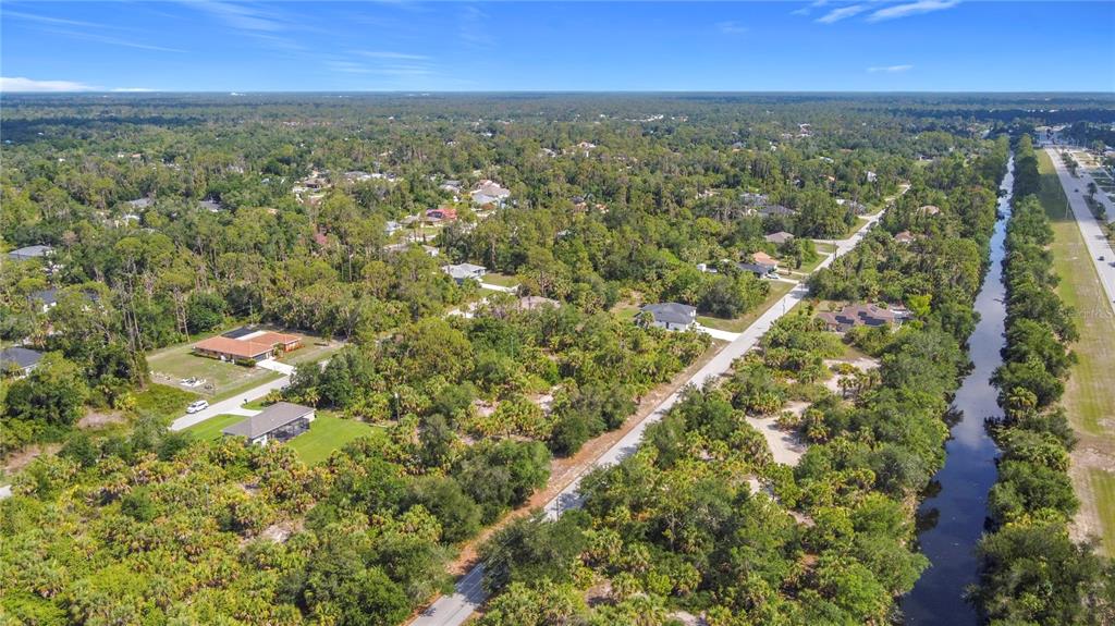356 Lindon Street Port Charlotte, FL 33954 - Photo 17 of 18 an aerial view of residential houses with city view and lake view