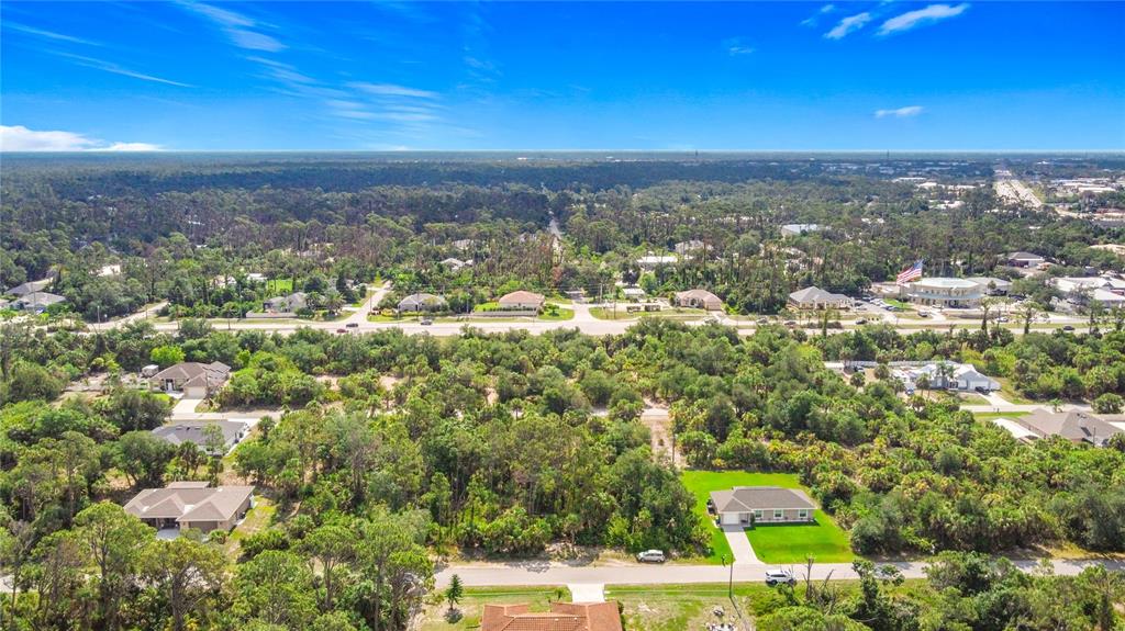 356 Lindon Street Port Charlotte, FL 33954 - Photo 6 of 18 a view of a city with tall buildings