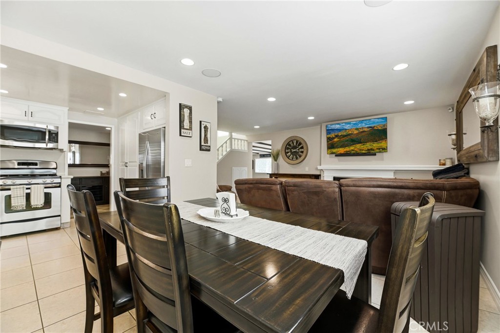 930 La Rue Avenue, Unit RUE La Verne, CA 91750 - Photo 13 of 63 a living room with stainless steel appliances furniture and a kitchen view