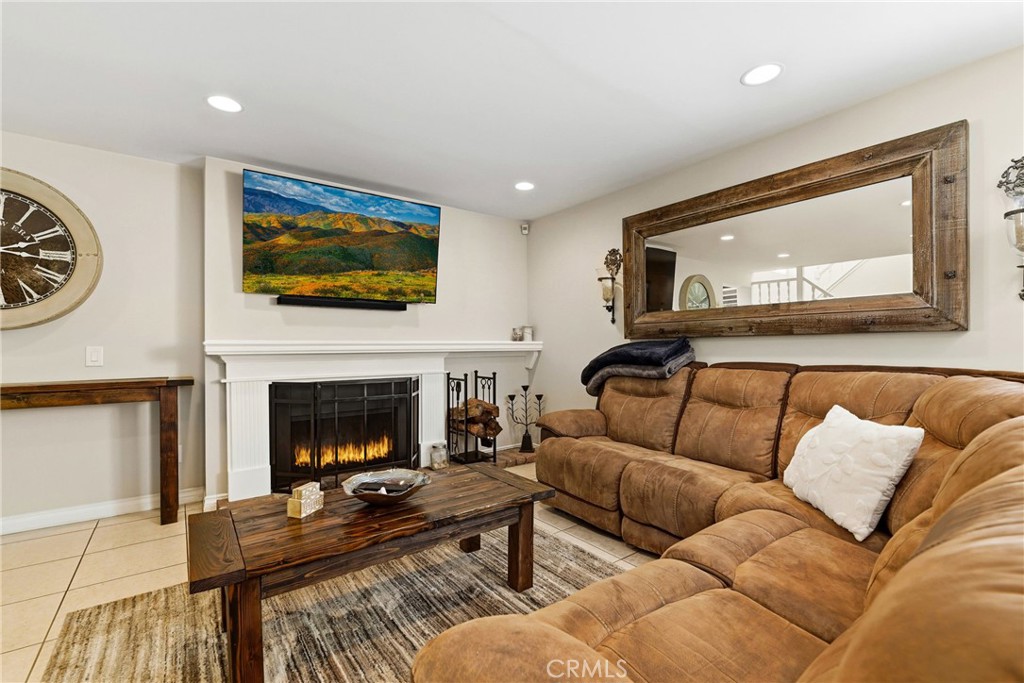 930 La Rue Avenue, Unit RUE La Verne, CA 91750 - Photo 19 of 63 a living room with furniture and a fireplace