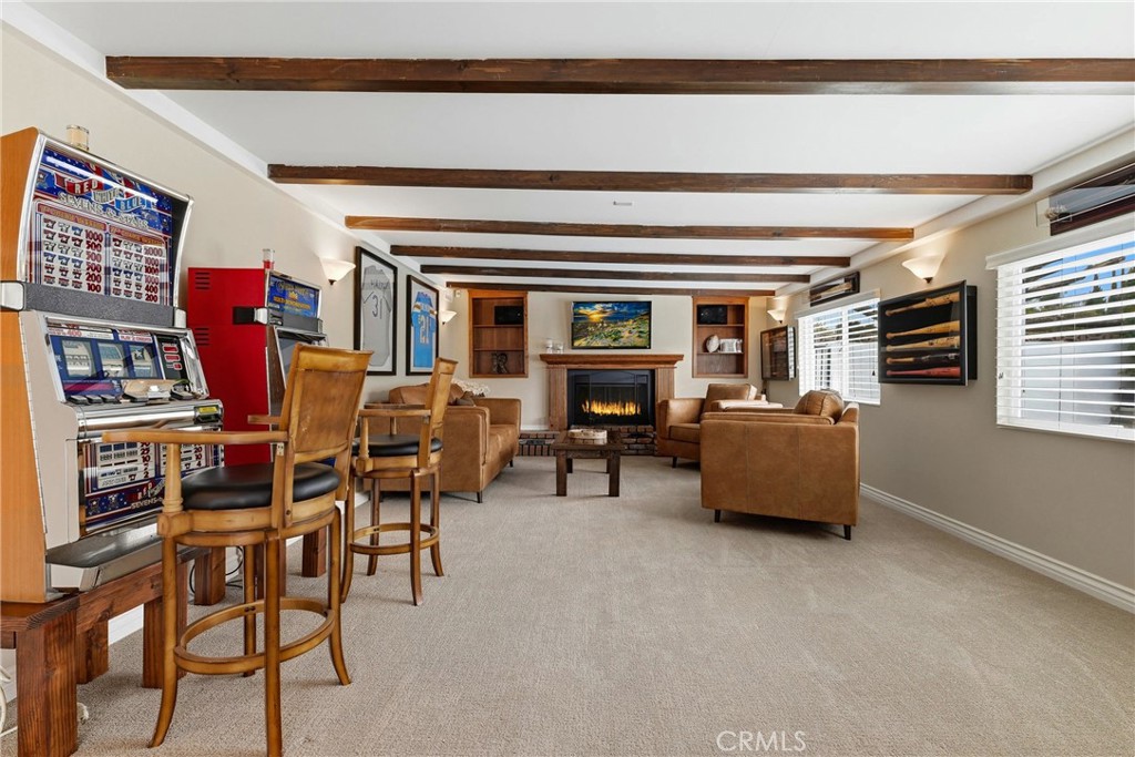 930 La Rue Avenue, Unit RUE La Verne, CA 91750 - Photo 27 of 63 a living room with furniture and a flat screen tv
