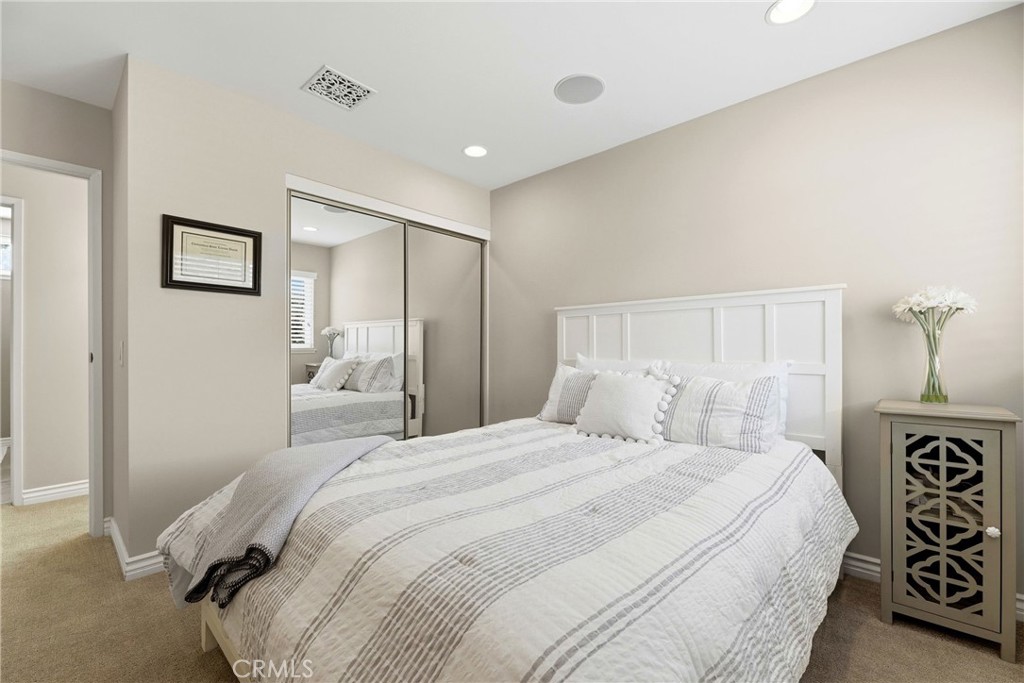 930 La Rue Avenue, Unit RUE La Verne, CA 91750 - Photo 32 of 63 a bedroom with a bed and a night stand