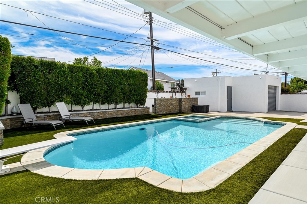 930 La Rue Avenue, Unit RUE La Verne, CA 91750 - Photo 50 of 63 a view of a swimming pool with a patio