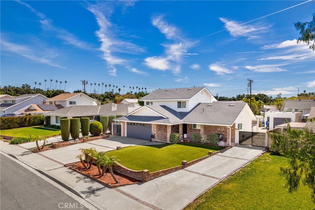 930 La Rue Avenue, Unit RUE La Verne, CA 91750 - Photo 6 of 63 a view of a house with a big yard and large trees