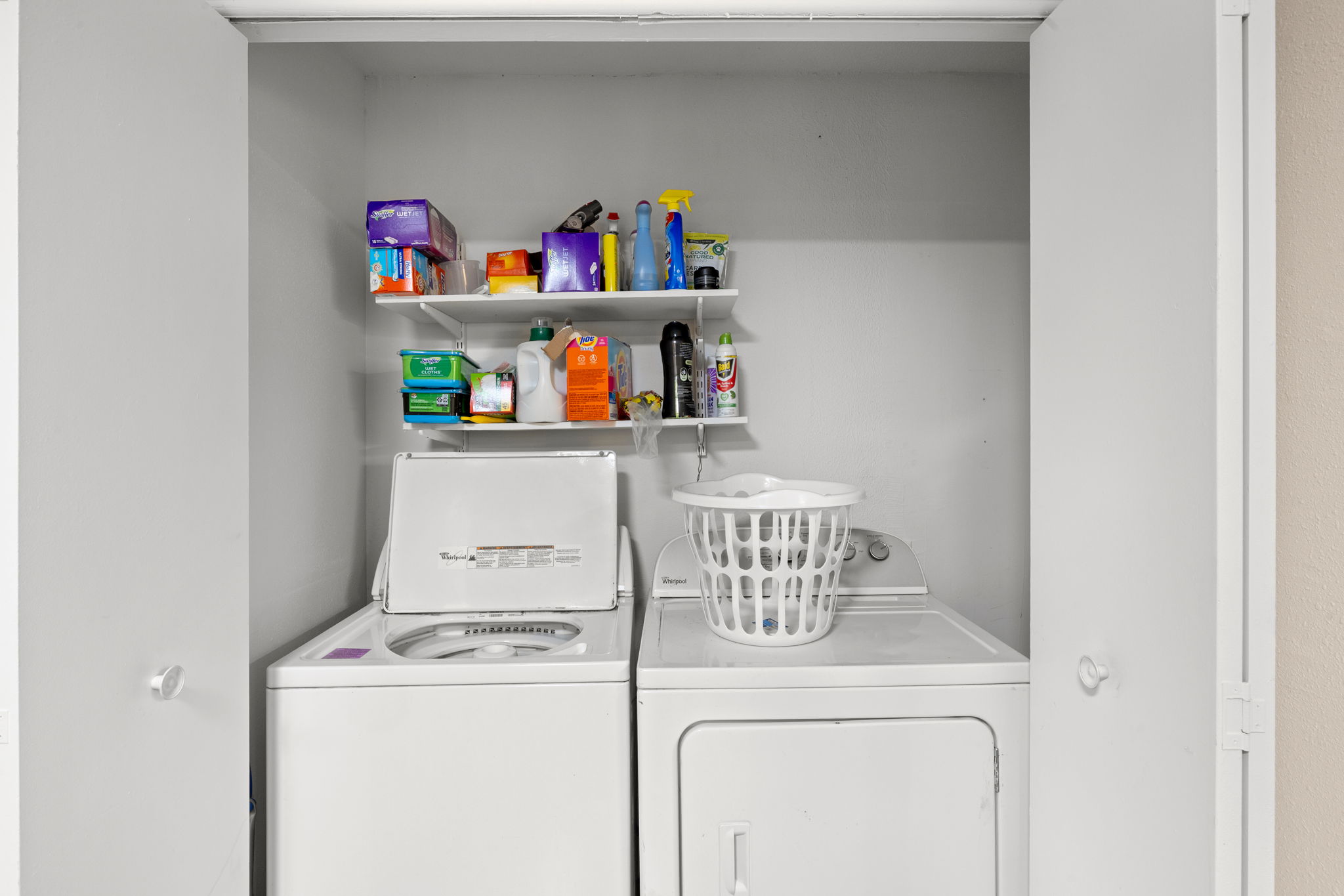 907 East 53rd Street Austin, TX 78751 - Photo 12 of 36 Functional laundry closet provides convenient and practical space for household chores.
