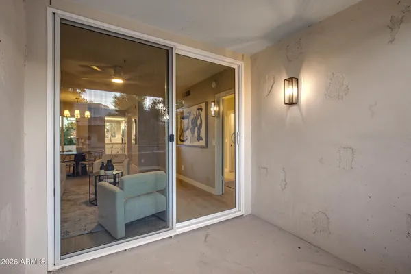 an empty room and glass door