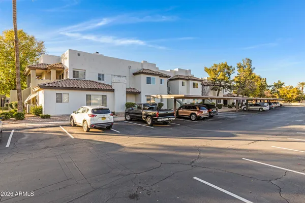 a view of a street with cars