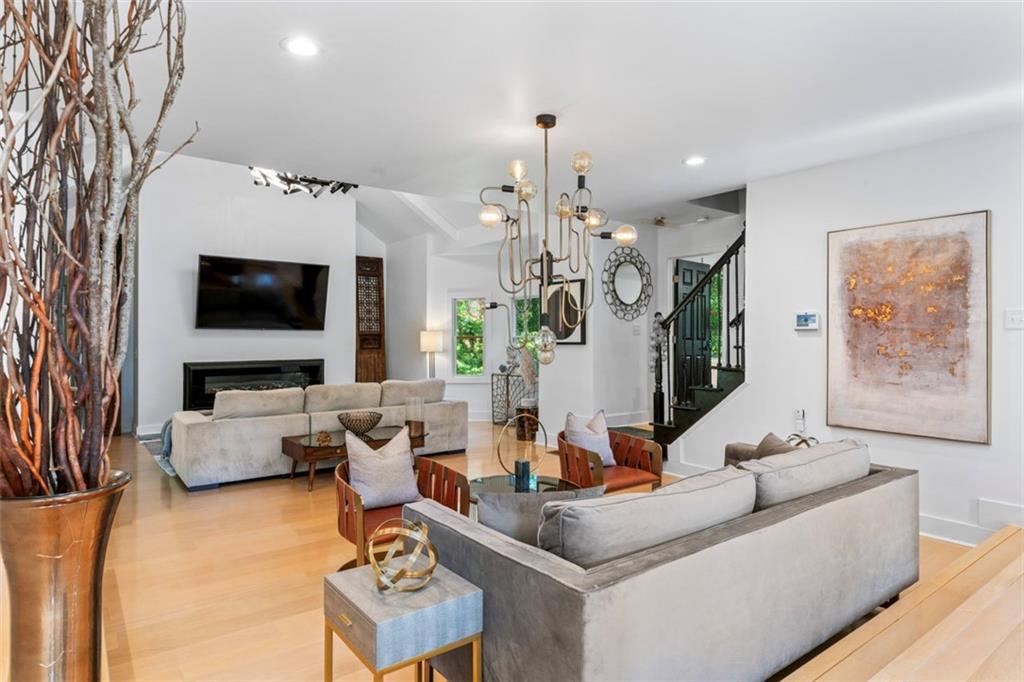 3519 Prince George Street Atlanta, GA 30344 - Photo 20 of 58 a living room with furniture and a flat screen tv