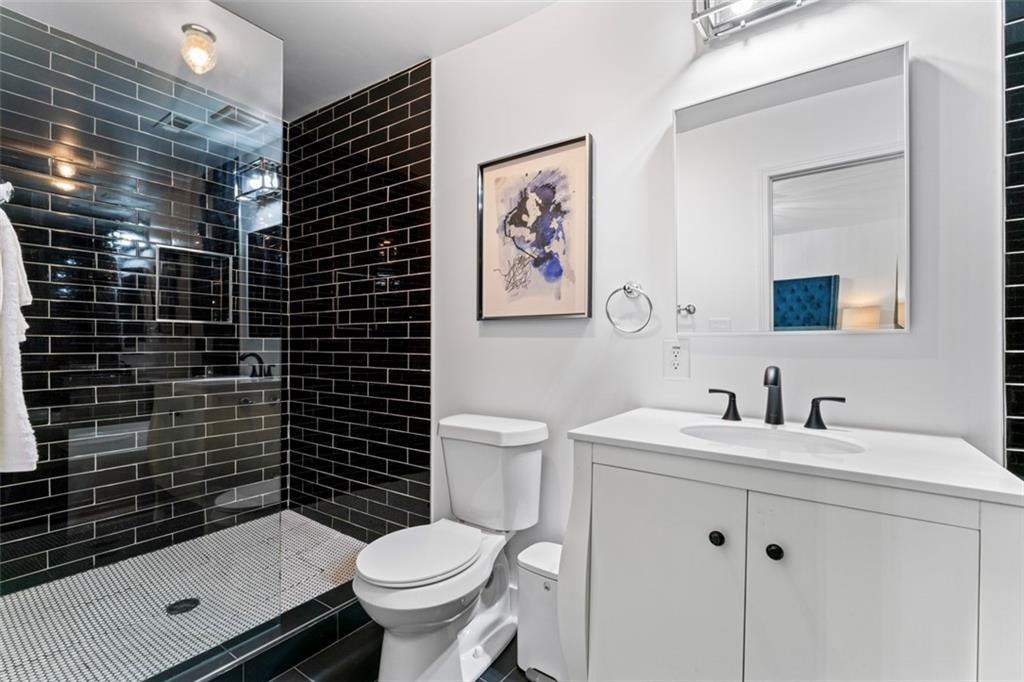 3519 Prince George Street Atlanta, GA 30344 - Photo 38 of 58 a bathroom with a sink toilet and shower