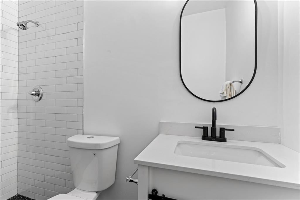 3519 Prince George Street Atlanta, GA 30344 - Photo 49 of 58 a bathroom with a sink and a mirror